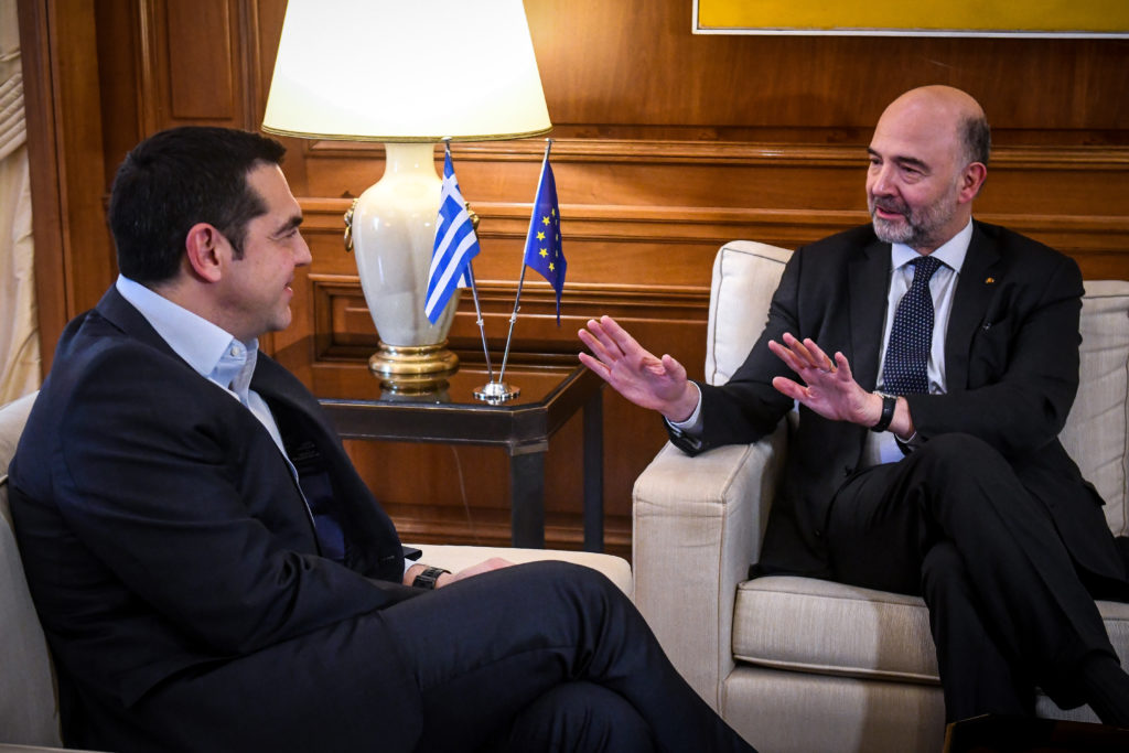 Αισιόδοξοι Τσίπρας και Μοσκοβισί ότι η Ελλάδα θα ολοκληρώσει και τα τελευταία βήματα