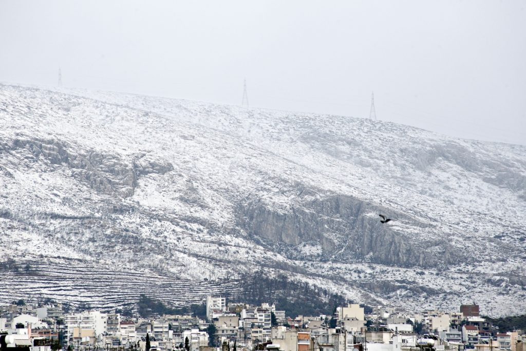 Δέκα υπέροχες φωτογραφίες της χιονισμένης Αθήνας (Photos)