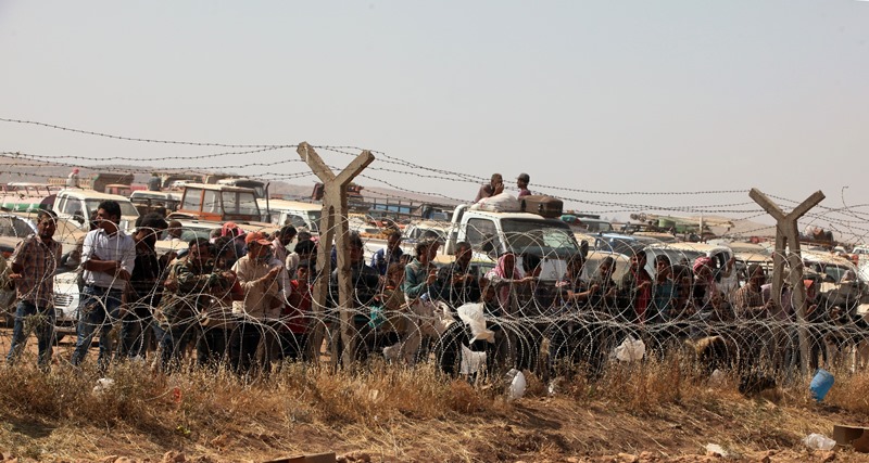 OHE: Πάνω από 100.000 άνθρωποι εκτοπίστηκαν από τις πόλεις Ρας αλ Αϊν και Τελ Αμπιάντ