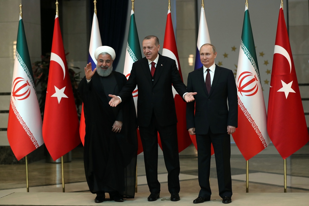 Έδωσαν τα «χέρια» Πούτιν-Ερντογάν-Ροχανί για κοινό μέτωπο στη Συρία