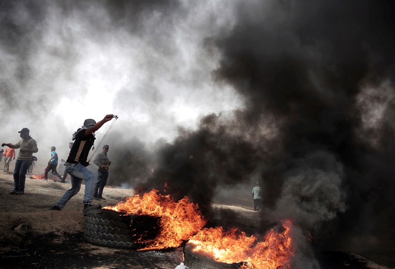 Νέες συγκρούσεις στη Λωρίδα της Γάζας με δυο νεκρούς και δώδεκα τραυματίες (Photos)
