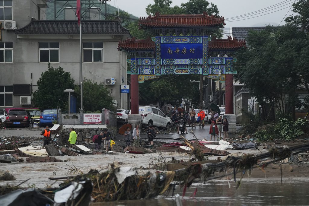 Κίνα: Τουλάχιστον 11 νεκροί και 27 αγνοούμενοι από τις φονικές πλημμύρες – Ανυπολόγιστες καταστροφές (Photos)